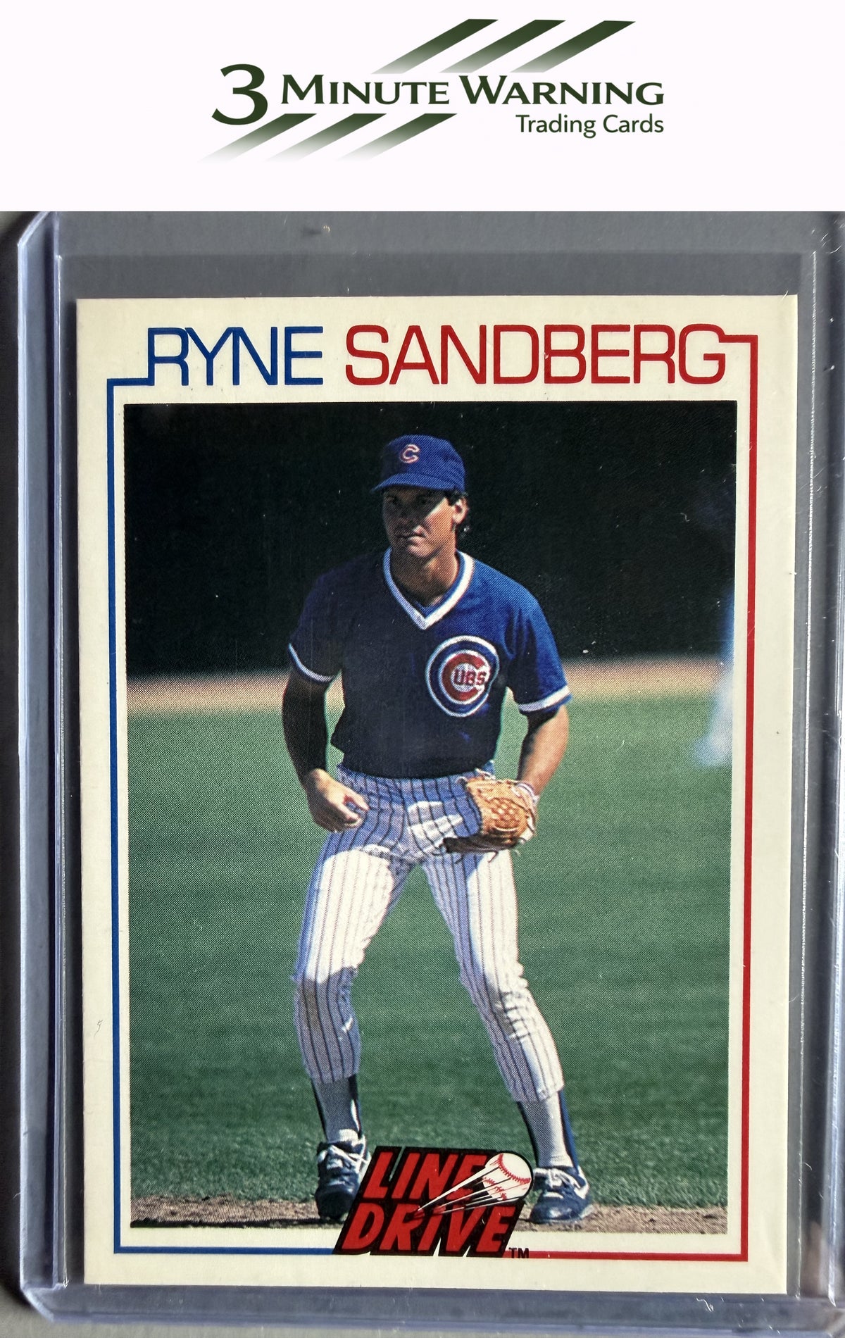 1991 Line Drive Ryne Sandberg #6 Ryne Sandberg / Blue uniform / Glove at waist